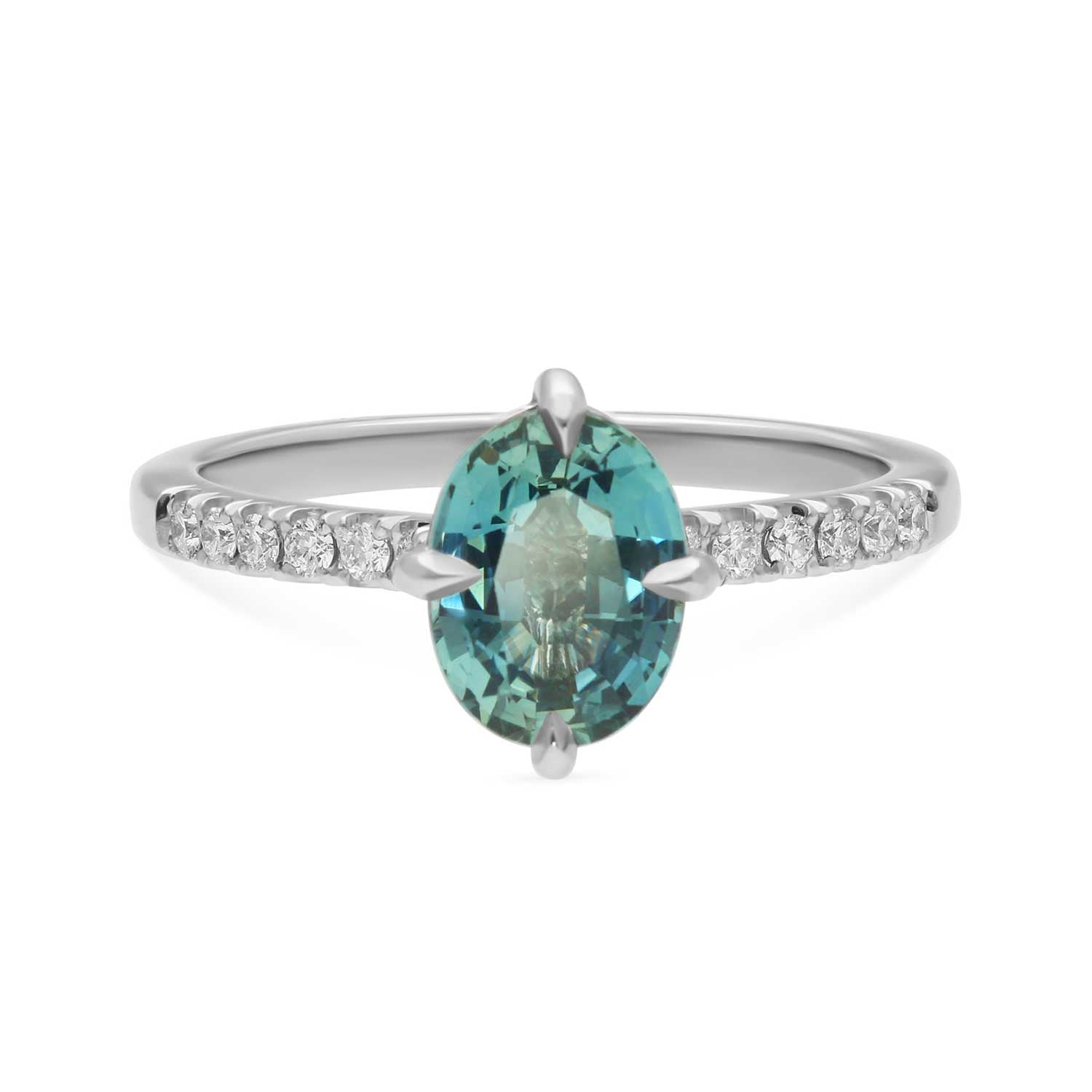 MILA Platinum Solitaire Ring with Oval Teal Sapphire and Diamond Shoulders made in recycled platinum by ethical jeweller E.C.One London in our B Corp certified workshop