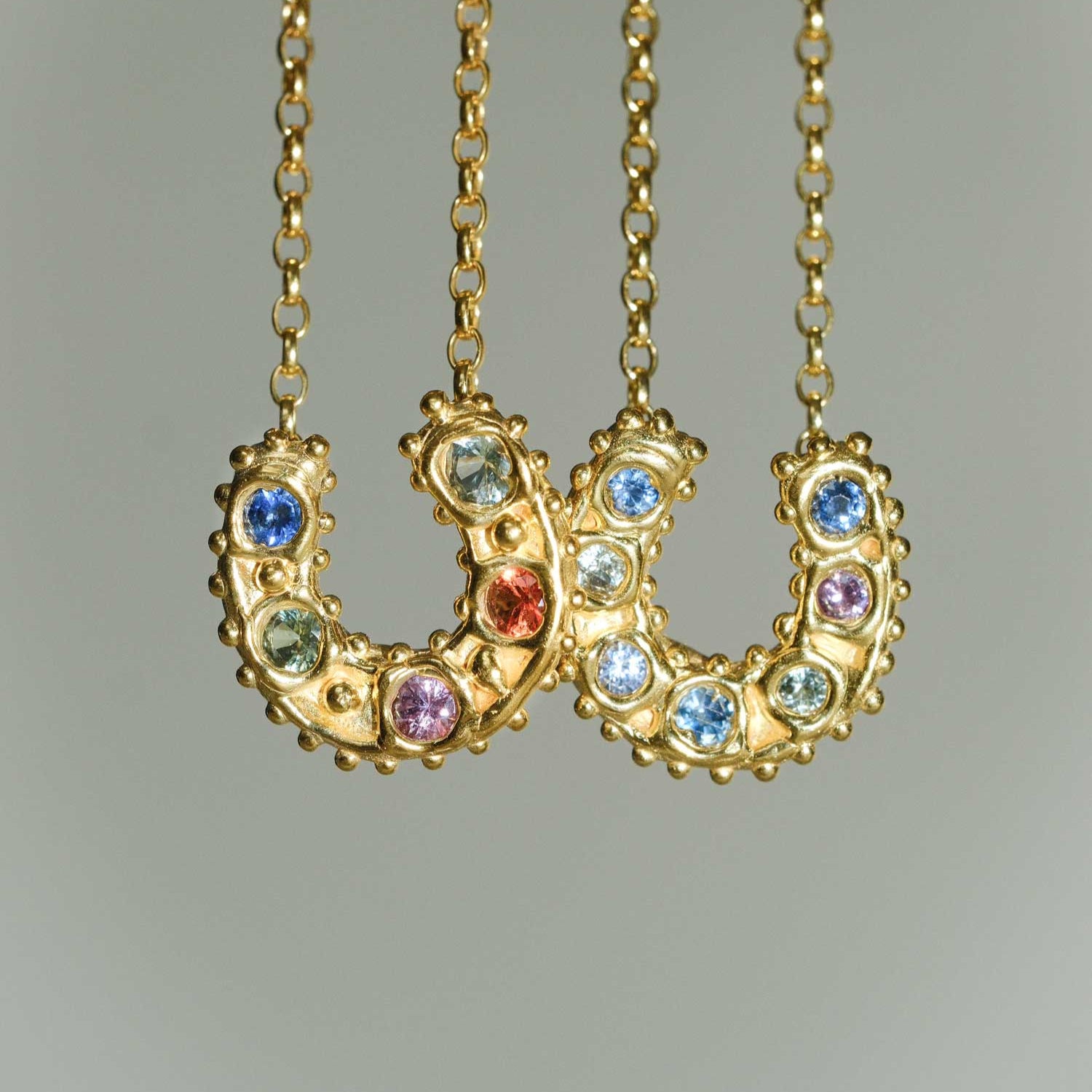 Sharlala at ethical jewellers E.C.One London HORSESHOE Pendant with Mixed Sapphires