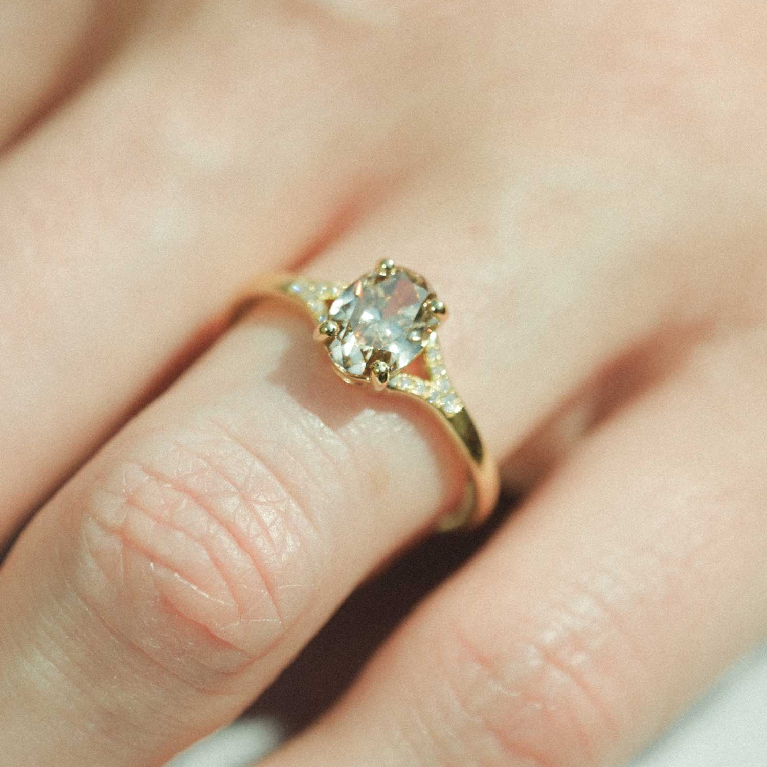 JUNO Gold Solitaire Ring with Oval Brown Diamond and diamond shoulders made in recycled gold by ethical jeweller E.C.One London in our B Corp certified workshop