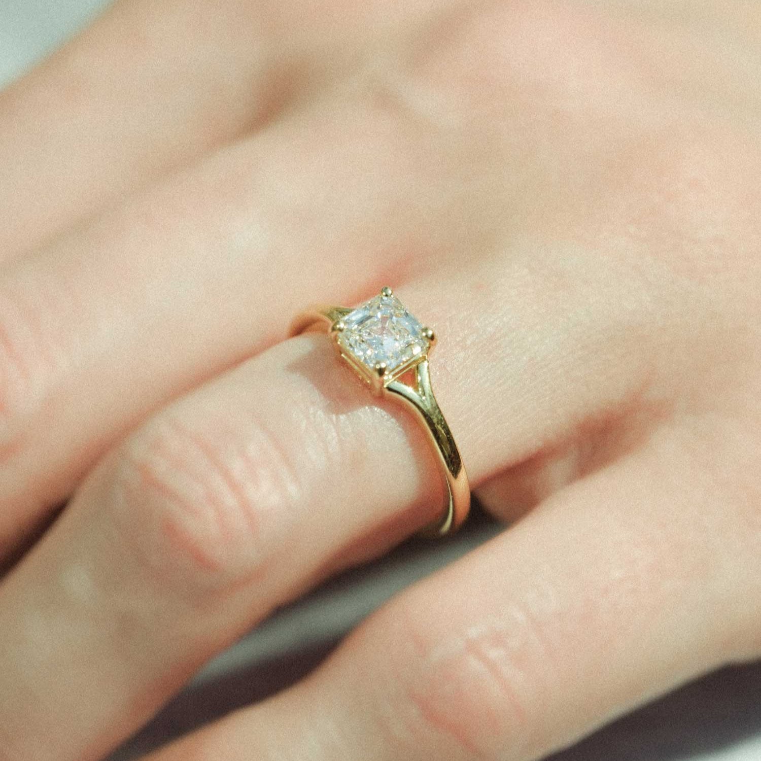 JUNO Gold Solitaire Ring with Asscher Cut White Diamond made in recycled gold by ethical jeweller E.C.One London in our B Corp certified workshop 