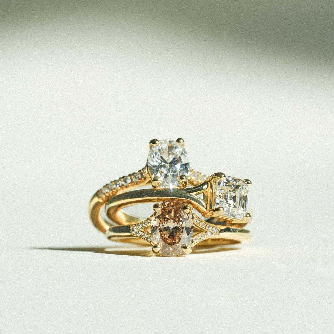 JUNO Gold Solitaire Ring with Oval Brown Diamond and diamond shoulders made in recycled gold by ethical jeweller E.C.One London in our B Corp certified workshop