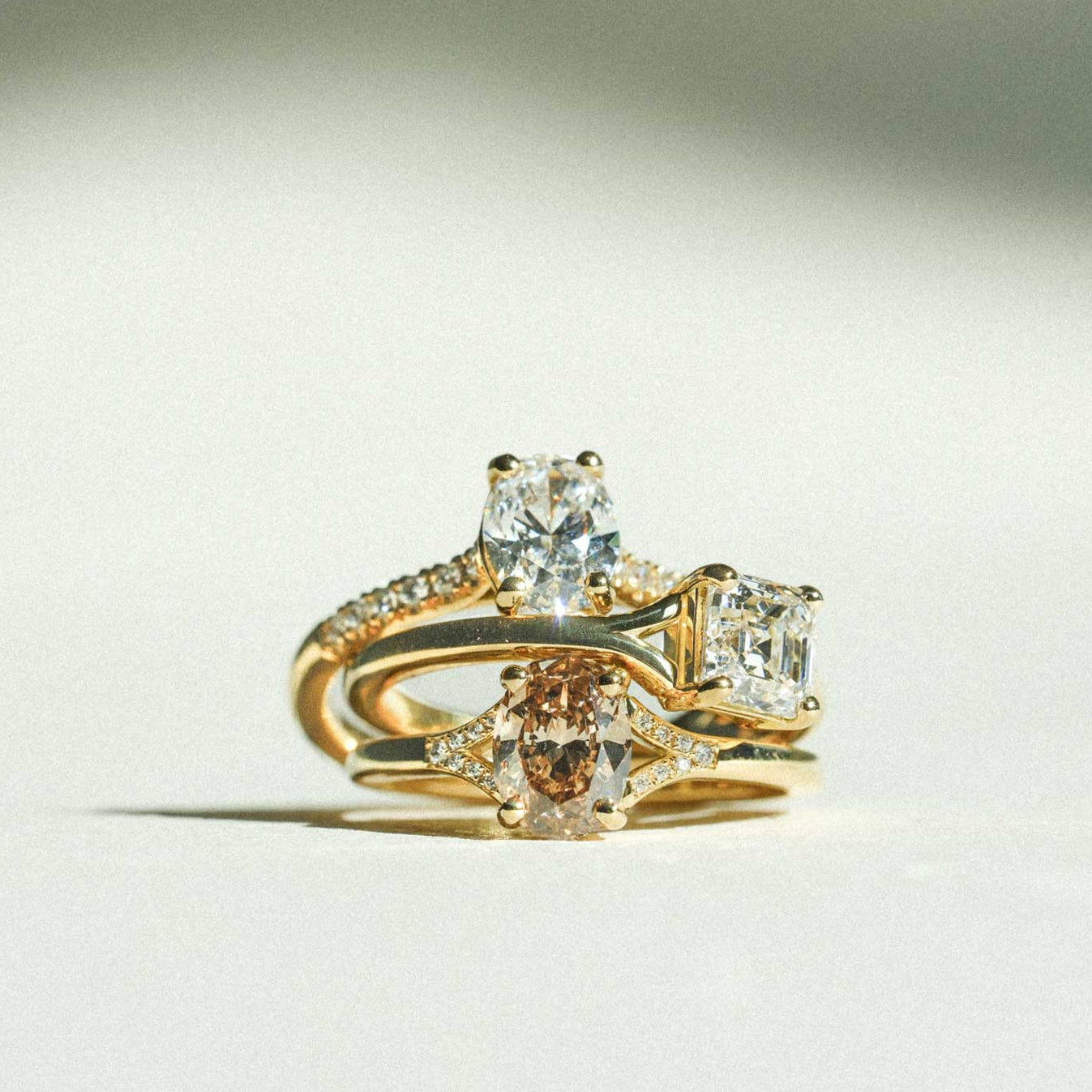 JUNO Gold Solitaire Ring with Oval Brown Diamond and diamond shoulders made in recycled gold by ethical jeweller E.C.One London in our B Corp certified workshop