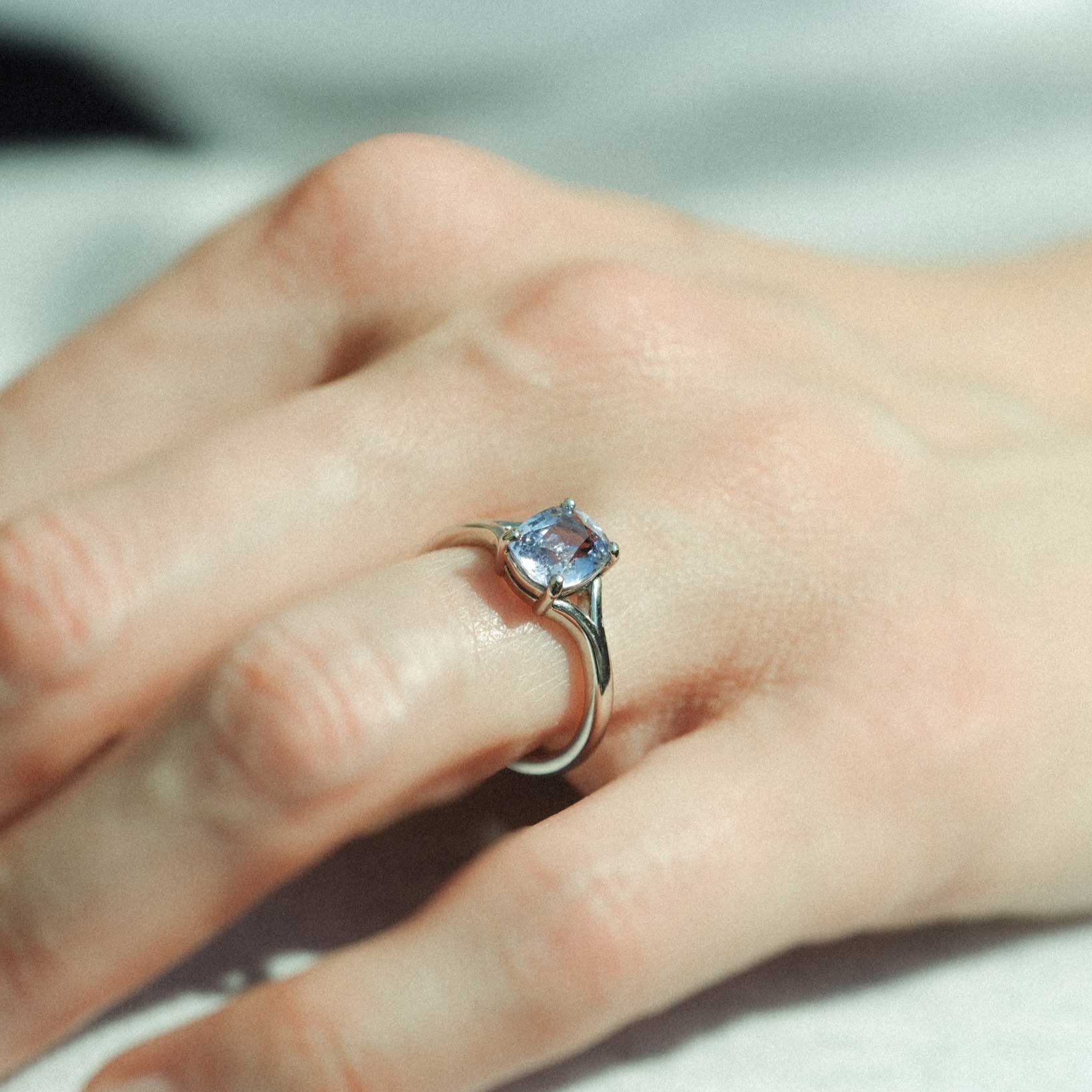 JUNO Platinum Solitaire Ring with Oval Pale Blue Sapphire made in recycled platinum by ethical jeweller E.C.One London in our B Corp certified workshop