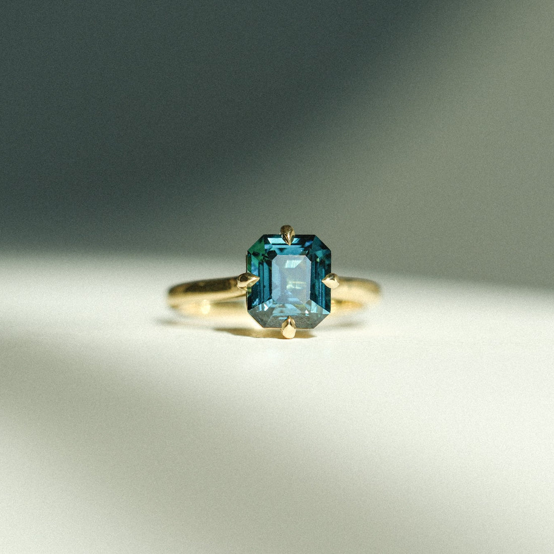 MILA Gold Solitaire Ring with Octagon Teal Sapphire
