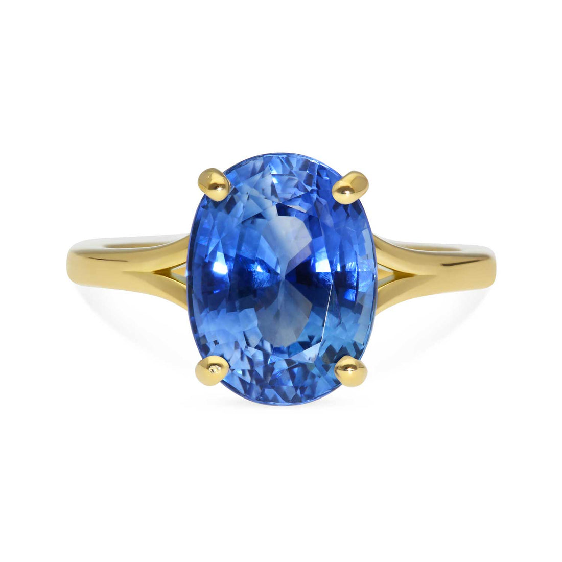 JUNO Gold Solitaire Ring with Oval Blue Sapphire made in recycled gold by ethical jeweller E.C.One London in our B Corp certified workshop