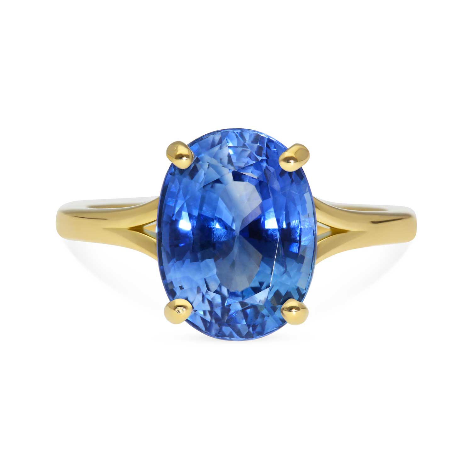 JUNO Gold Solitaire Ring with Oval Blue Sapphire made in recycled gold by ethical jeweller E.C.One London in our B Corp certified workshop