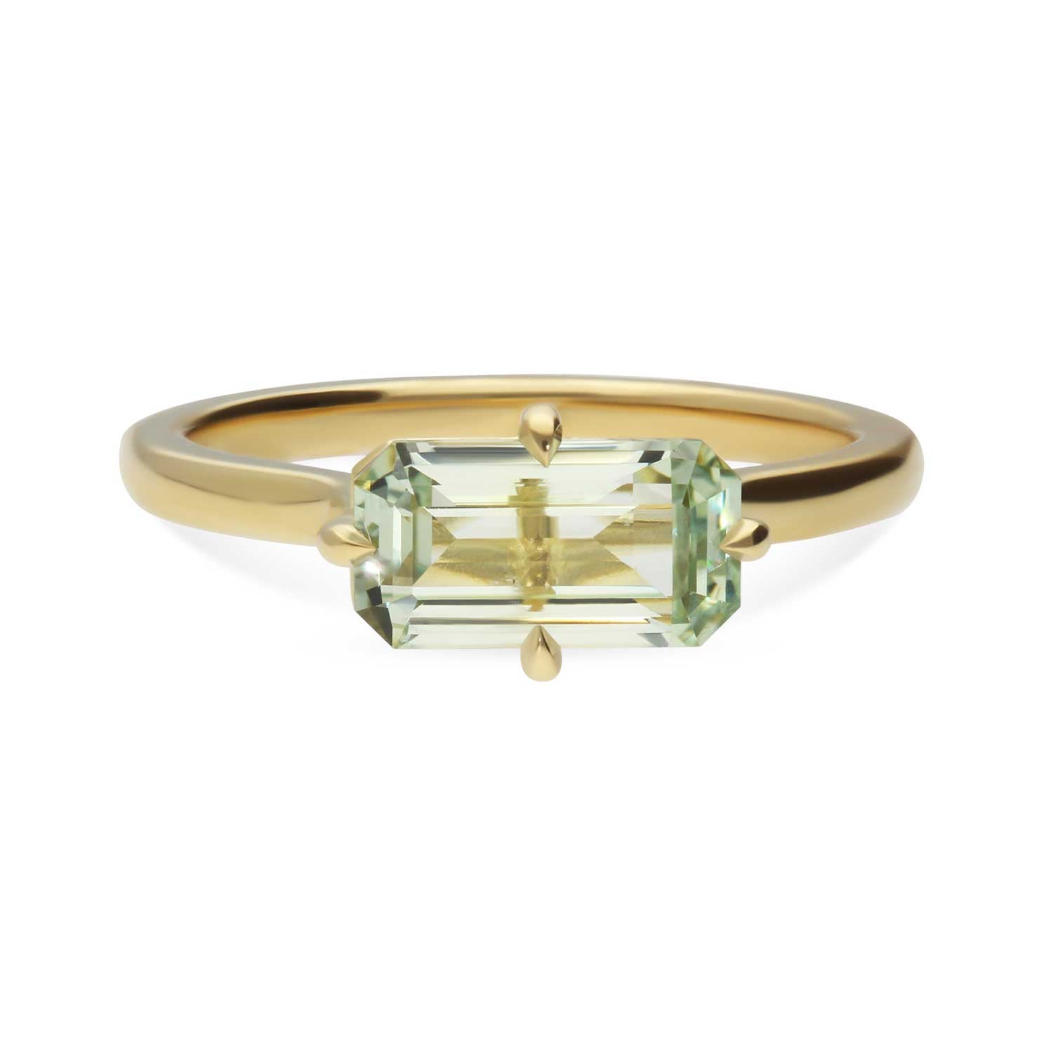 MILA Gold Solitaire Ring with Octagon Light Teal Sapphire made in recycled gold by ethical jeweller E.C.One London in our B Corp certified workshop