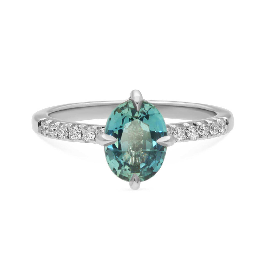 MILA Platinum Solitaire Ring with Oval Teal Sapphire and Diamond Shoulders made in recycled platinum by ethical jeweller E.C.One London in our B Corp certified workshop