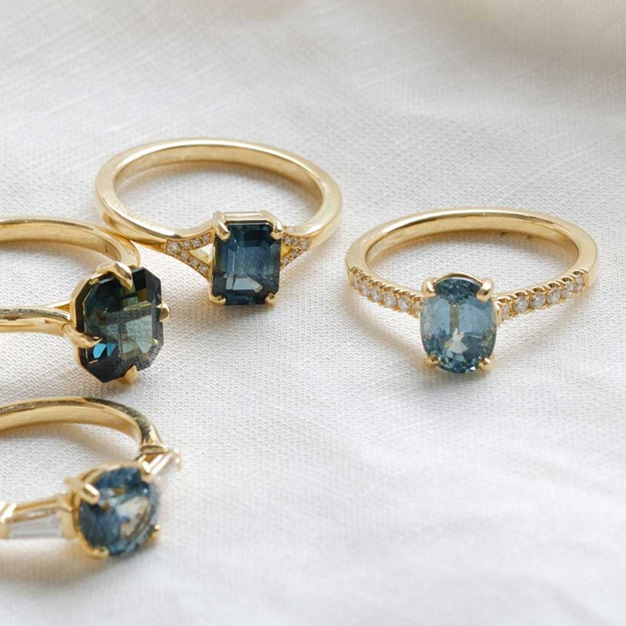 E.C.One ethical NANCY Oval Teal-Blue Sapphire and Diamond recycled gold engagement Ring handmade in our London B Corp certified workshop