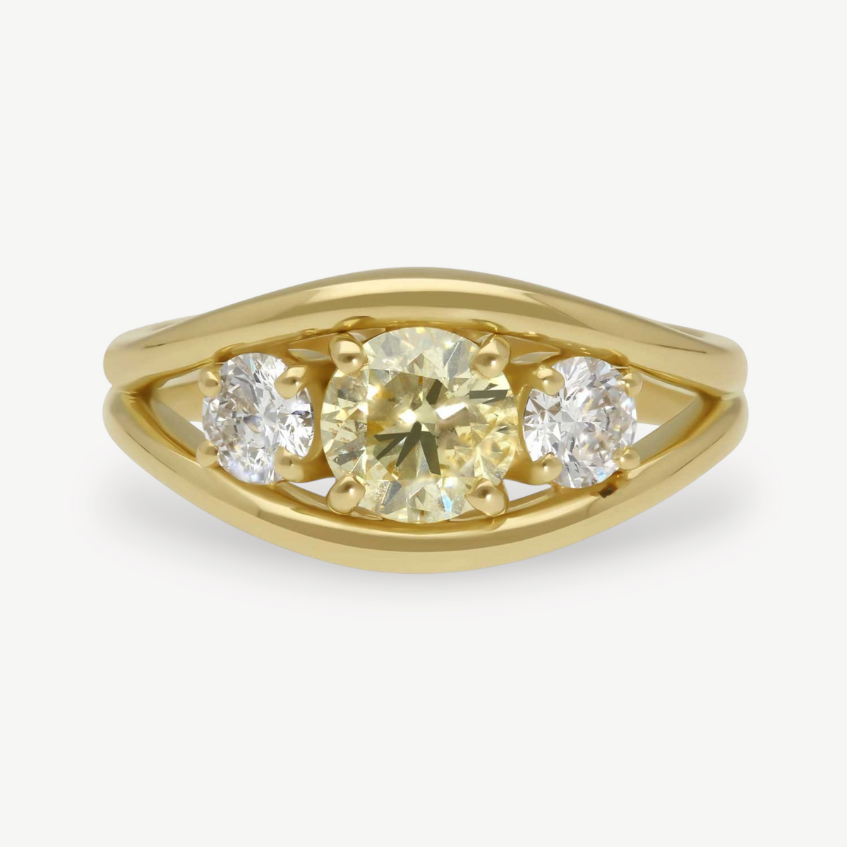 EC One Anna trilogy engagement ring in 18ct yellow gold with a central champagne diamond and two white side diamonds
