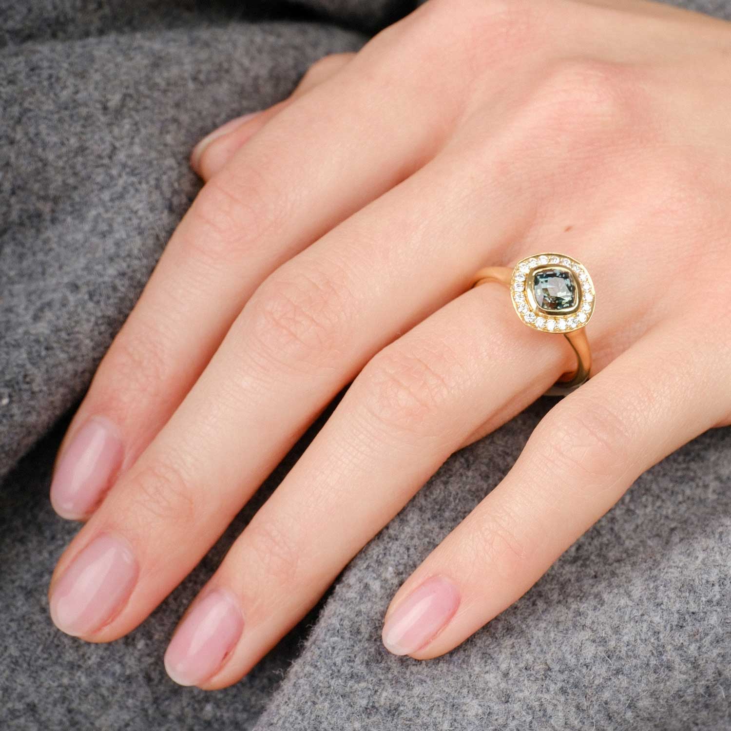 E.C.One ethical gold Frame teal sapphire and diamond ring made in our B Corp London workshop