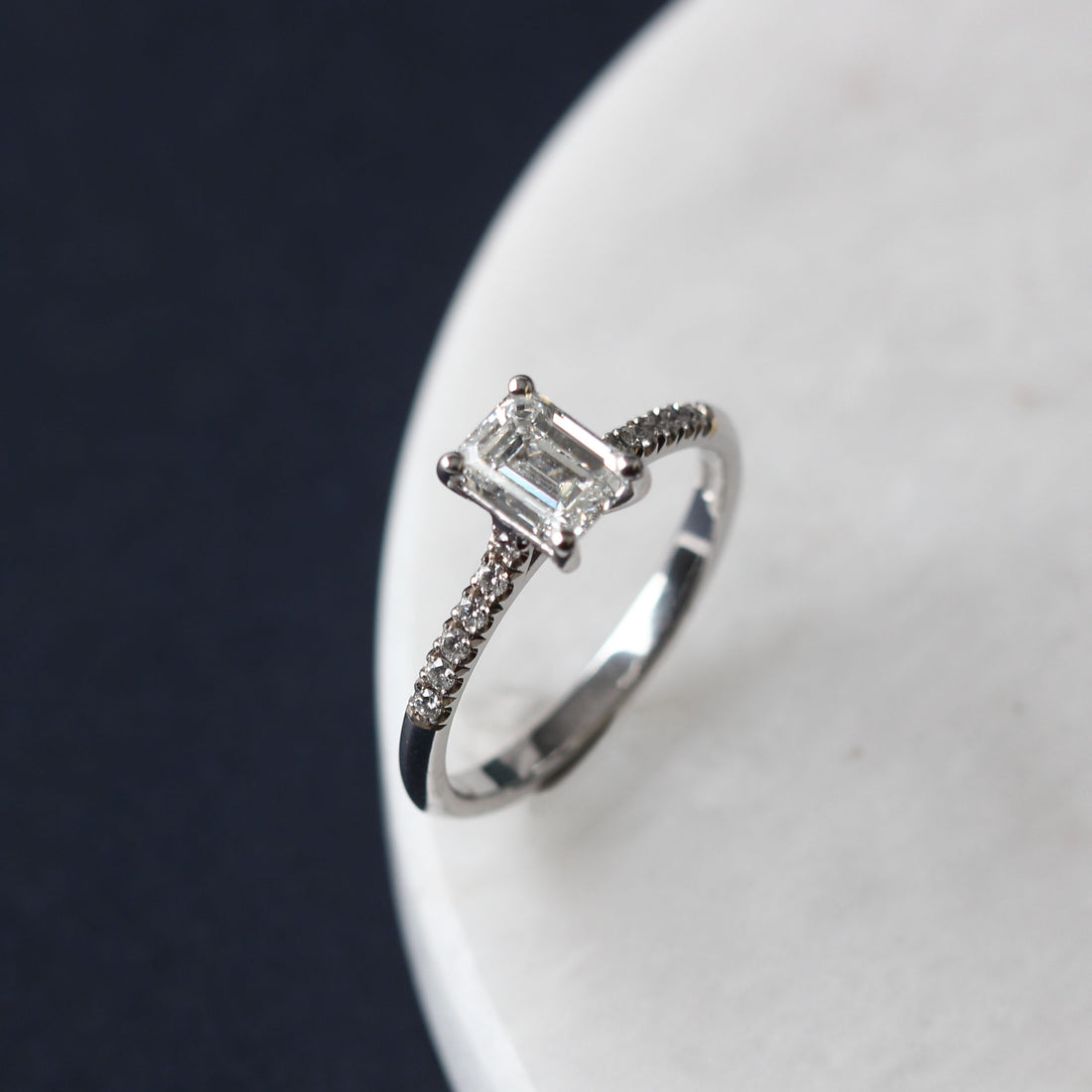 NANCY Emerald-Cut Diamond Solitaire Ring with Diamond Shoulders