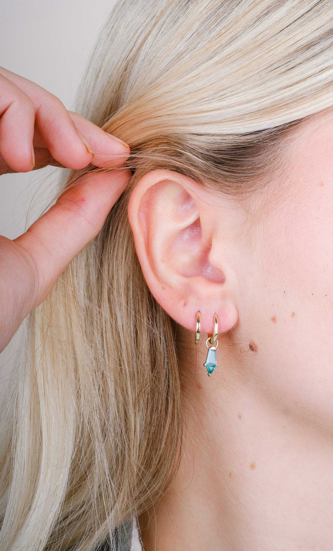 PRISM Labradorite and Emerald Gold earrings by Metier at ethical jewellery E.C.One London