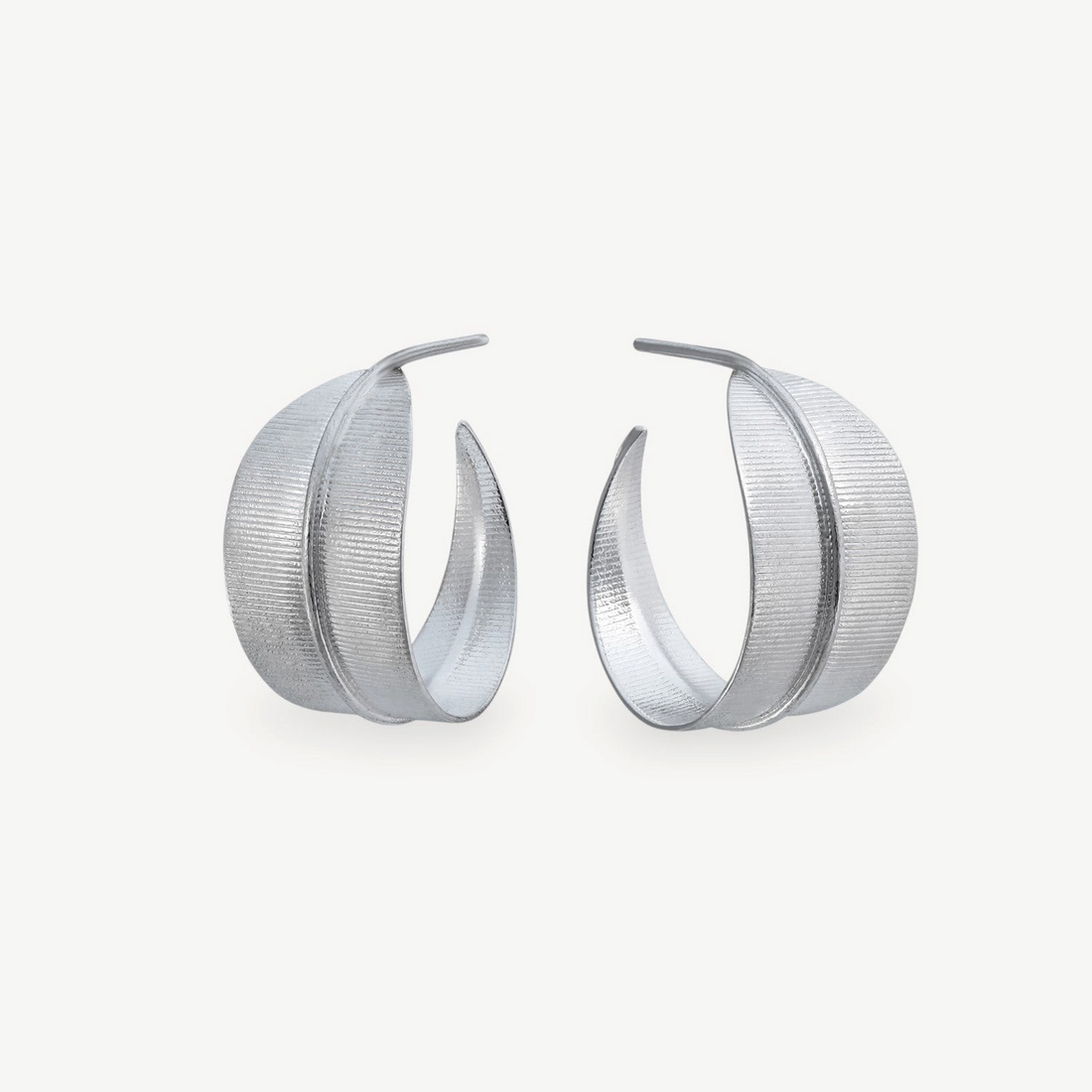 EC One Phoenix medium hoop earrings in textured sterling silver with a curved leaf-inspired design