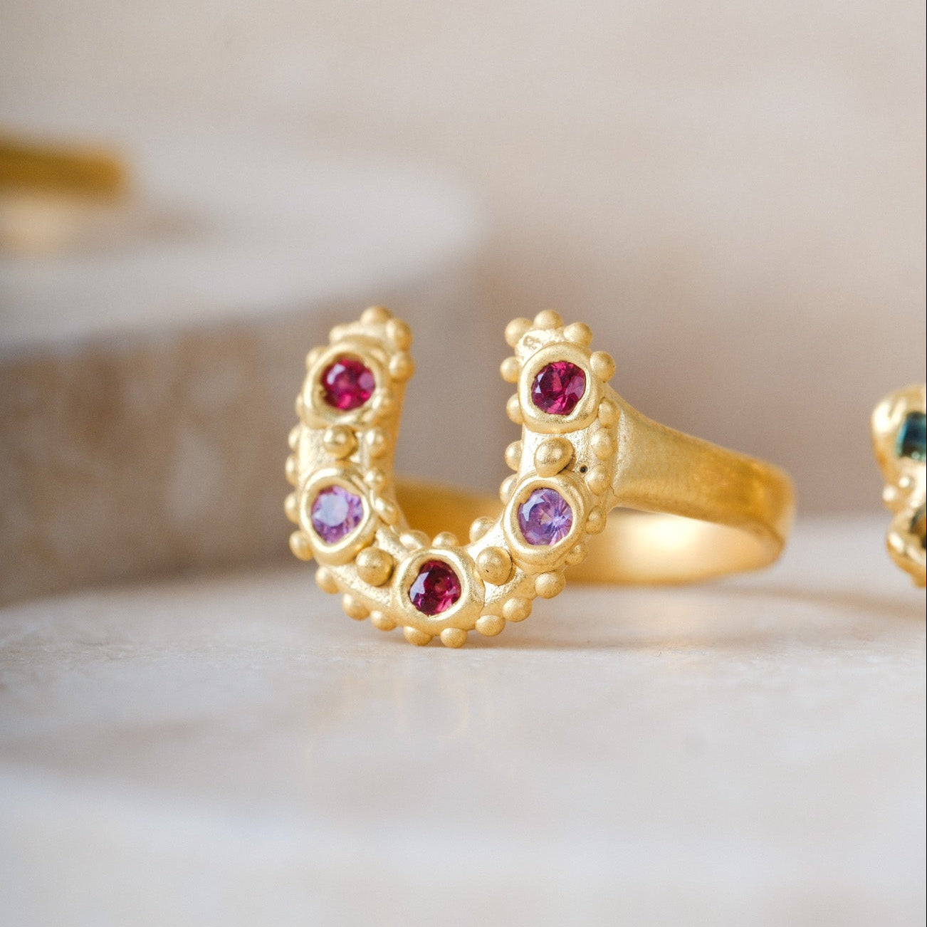HORSESHOE Slimline ring with 5 Mixed Sapphires