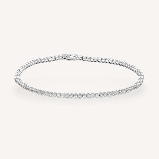 Bezel-Set Diamond Tennis Bracelet in White Gold by Ungar & Ungar at E.C.One London