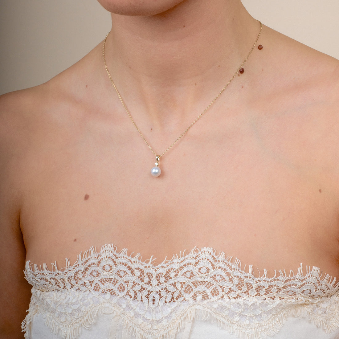 White Pearl and Diamond Gold Pendant Necklace