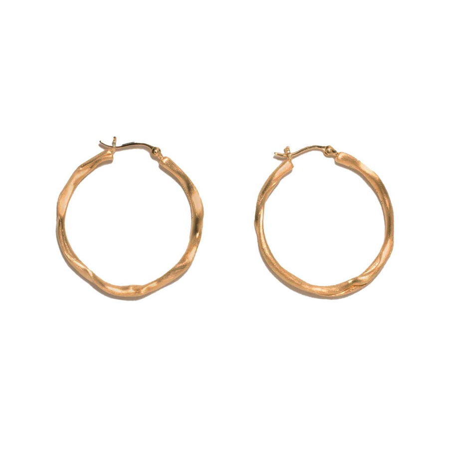 Completedworks Furrowed Hoop Earrings Gold Plated at EC One London