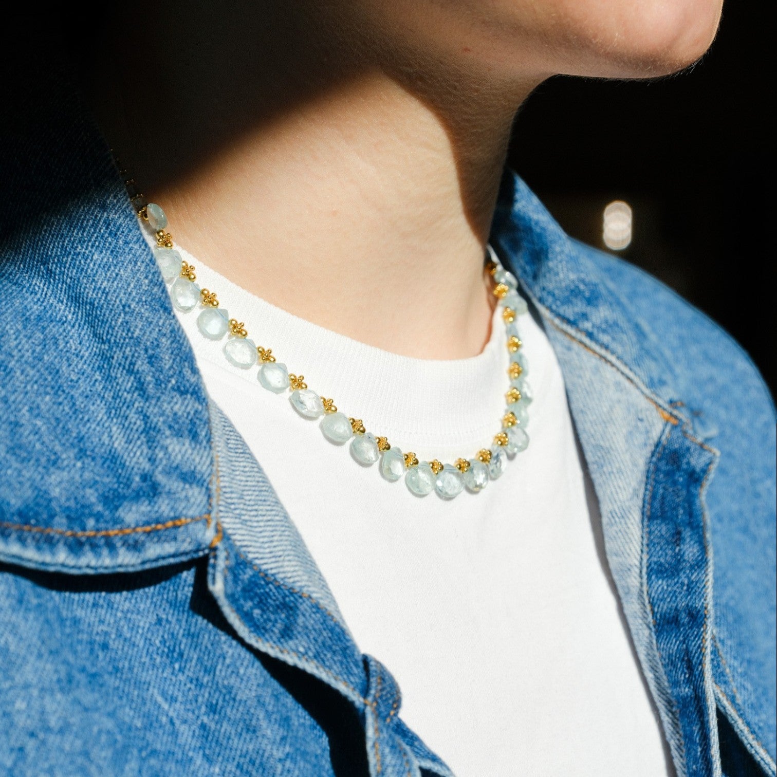 EC One Diva single line necklace with faceted pale blue-green aquamarine beads and gold plated silver accents.