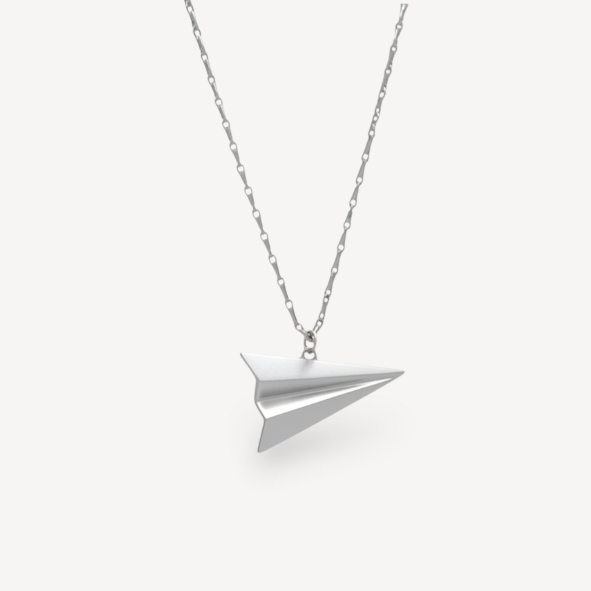 EC One blue recycled silver paper plane necklace on an 18" chain, handmade by Alice Barnes.