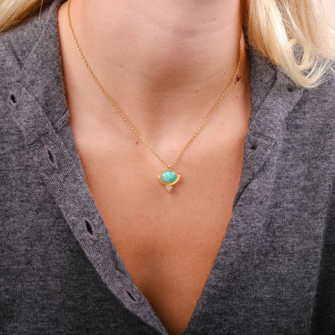 EC One Rosita Bonita gold plated necklace featuring an oval chrysoprase and peach moonstone in a bamboo-style frame.