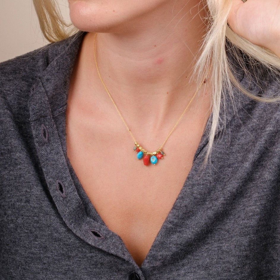 EC One Collette necklace featuring coral and turquoise gemstone beads on a gold plated recycled silver chain
