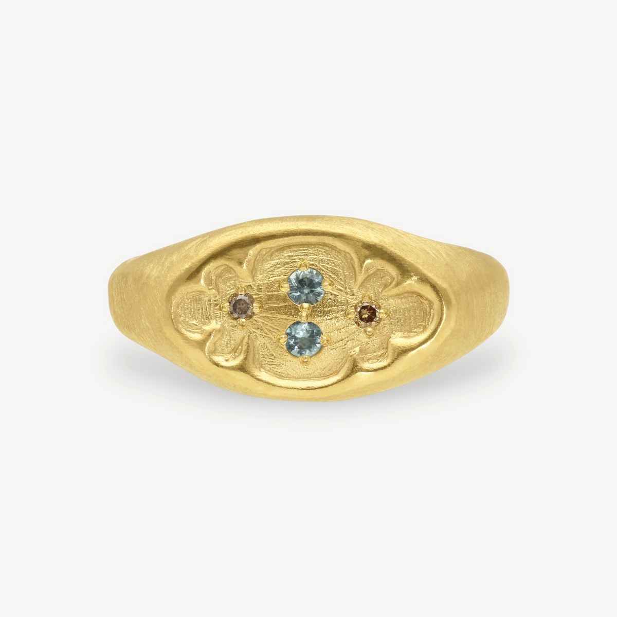 EC One Dormer ring in gold plated metal featuring two blue tourmalines and two brown diamonds in a floral setting.