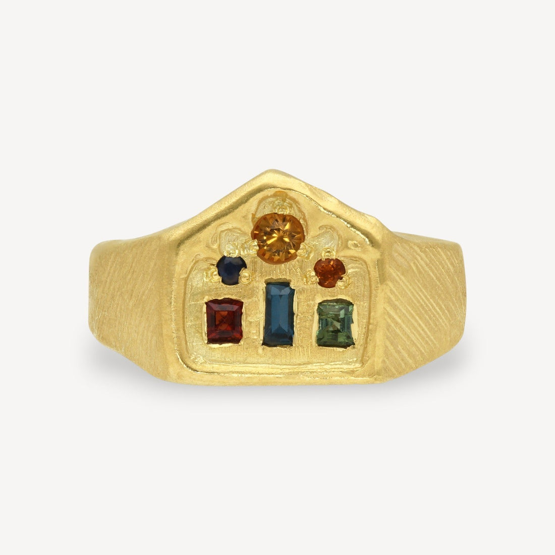 EC One gold plated ring featuring a textured band and a cluster of mixed colourful gemstones in various shapes.