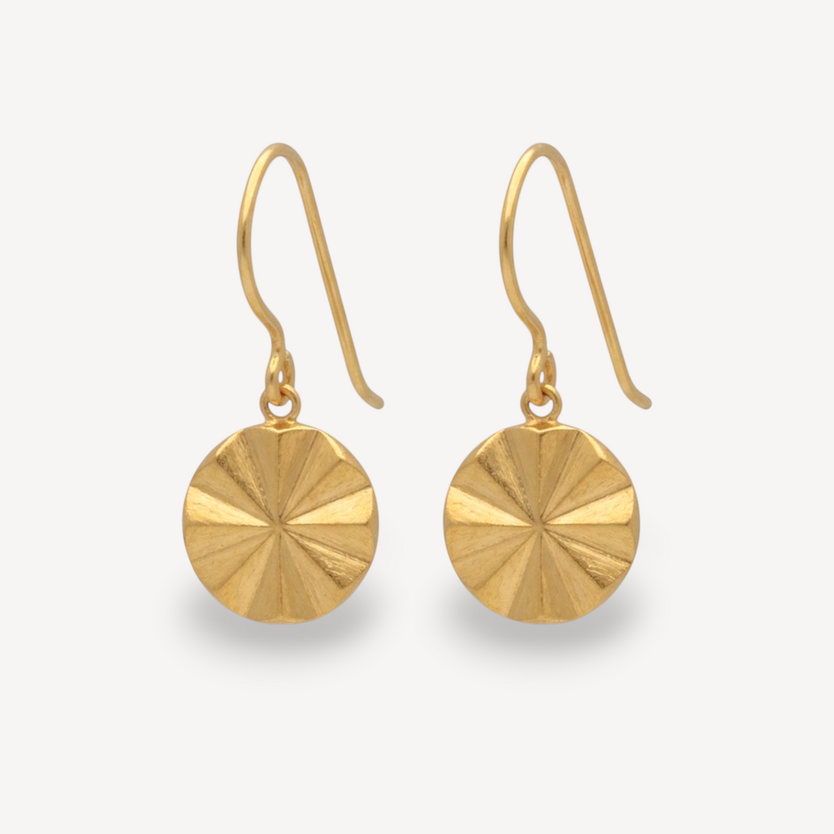 EC One Polaris starburst drop hook earrings in gold plated recycled silver with a textured sunray design.