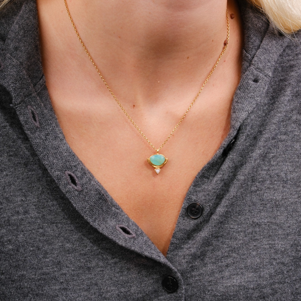 EC One Rosita Bonita gold plated bamboo hammock pendant necklace featuring a green opal and small pink opal detail.