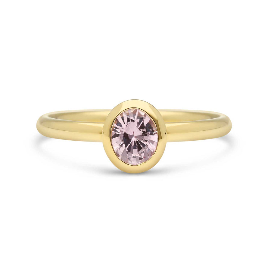 EC One Oval Pastel Pink Madagascan Sapphire Solitaire Ring in recycled yellow gold made by hand in our London B Corp workshop