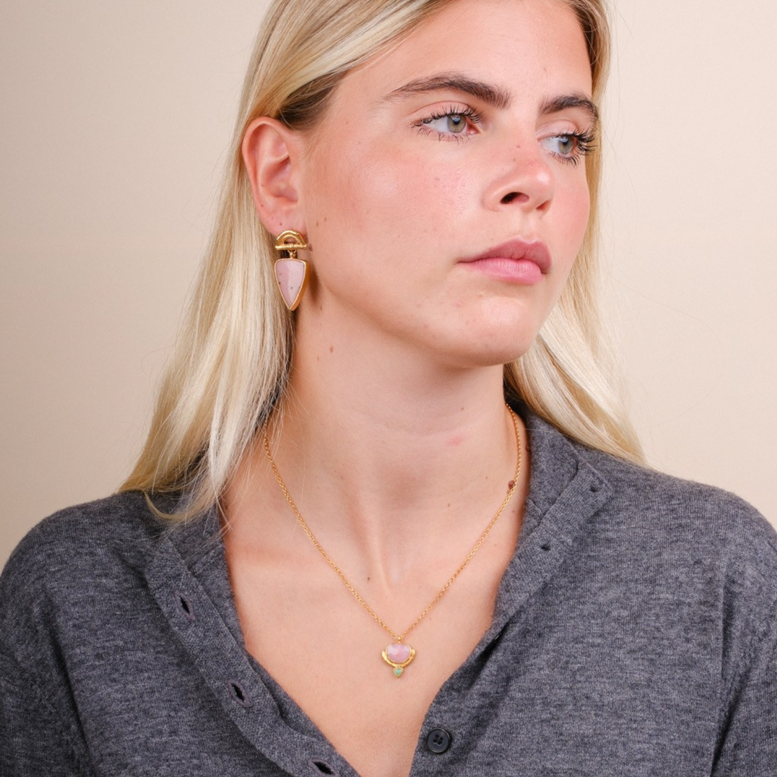 EC One Rosita Bonita gold plated bamboo pendant necklace featuring a pink opal and chrysoprase worn by a blonde model