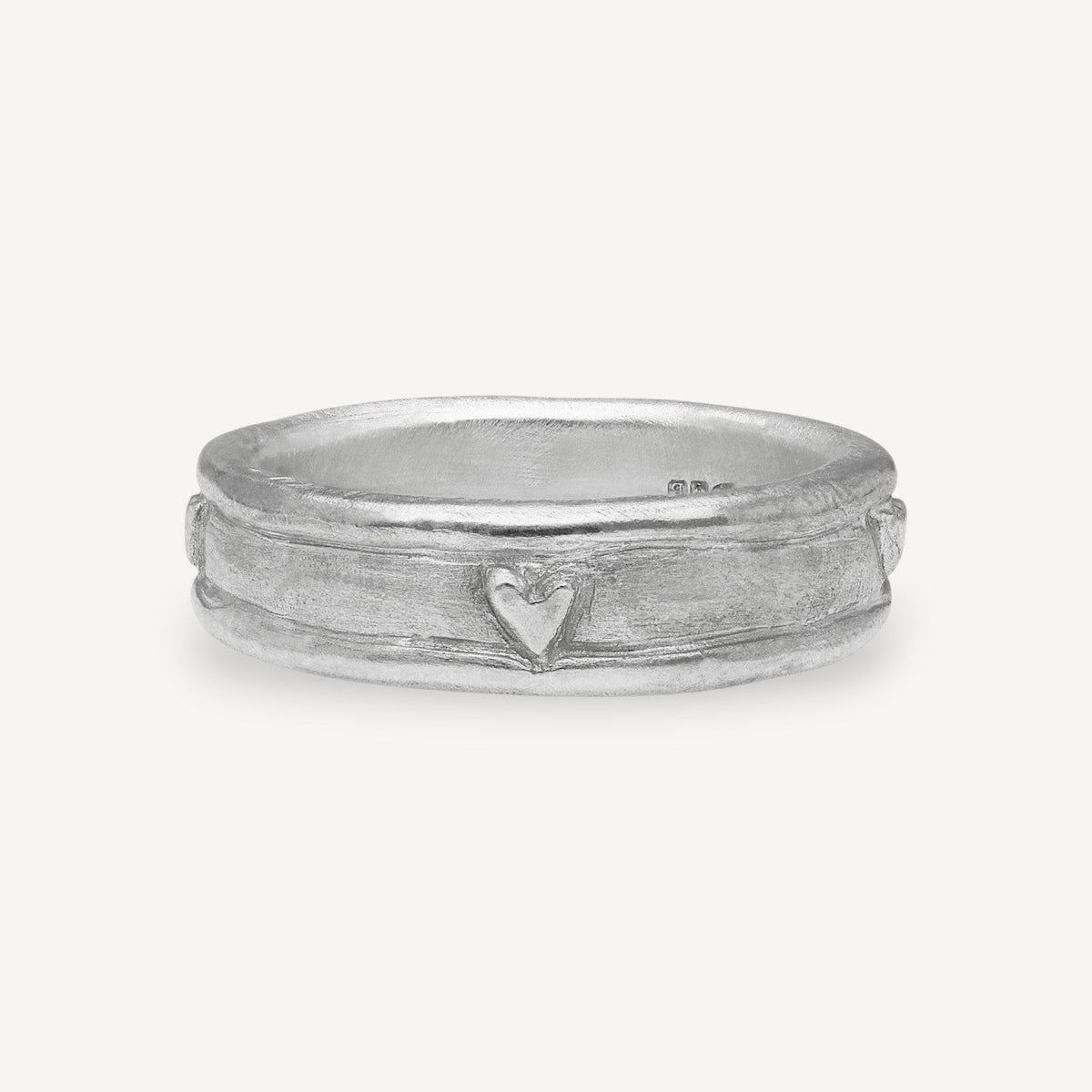 EC One Pour Toujours eternity ring in brushed sterling silver featuring a delicate embossed heart pattern