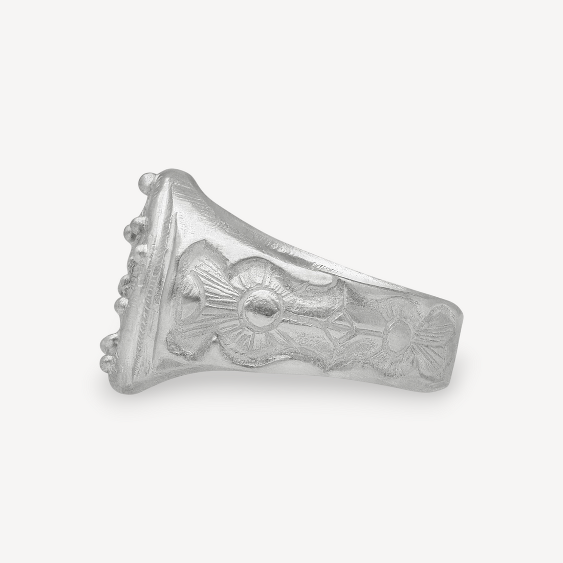 EC One Rose Window ring in silver featuring intricate floral engraving and a side profile view