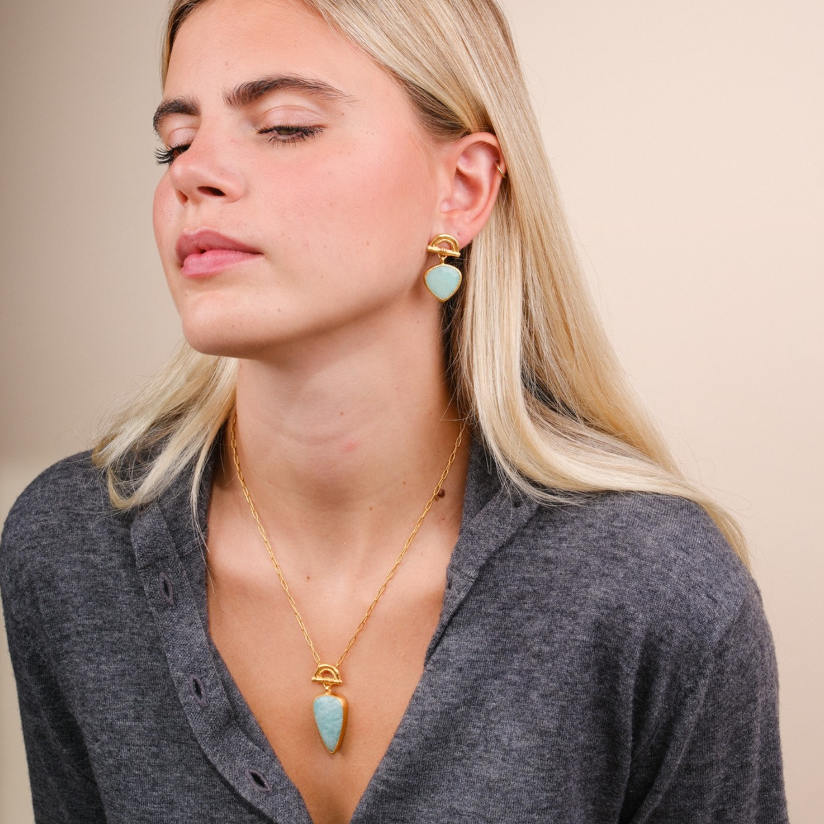 EC One SUNRISE pendant necklace featuring a pear-shaped Amazonite gemstone on a gold-plated bamboo arch setting.