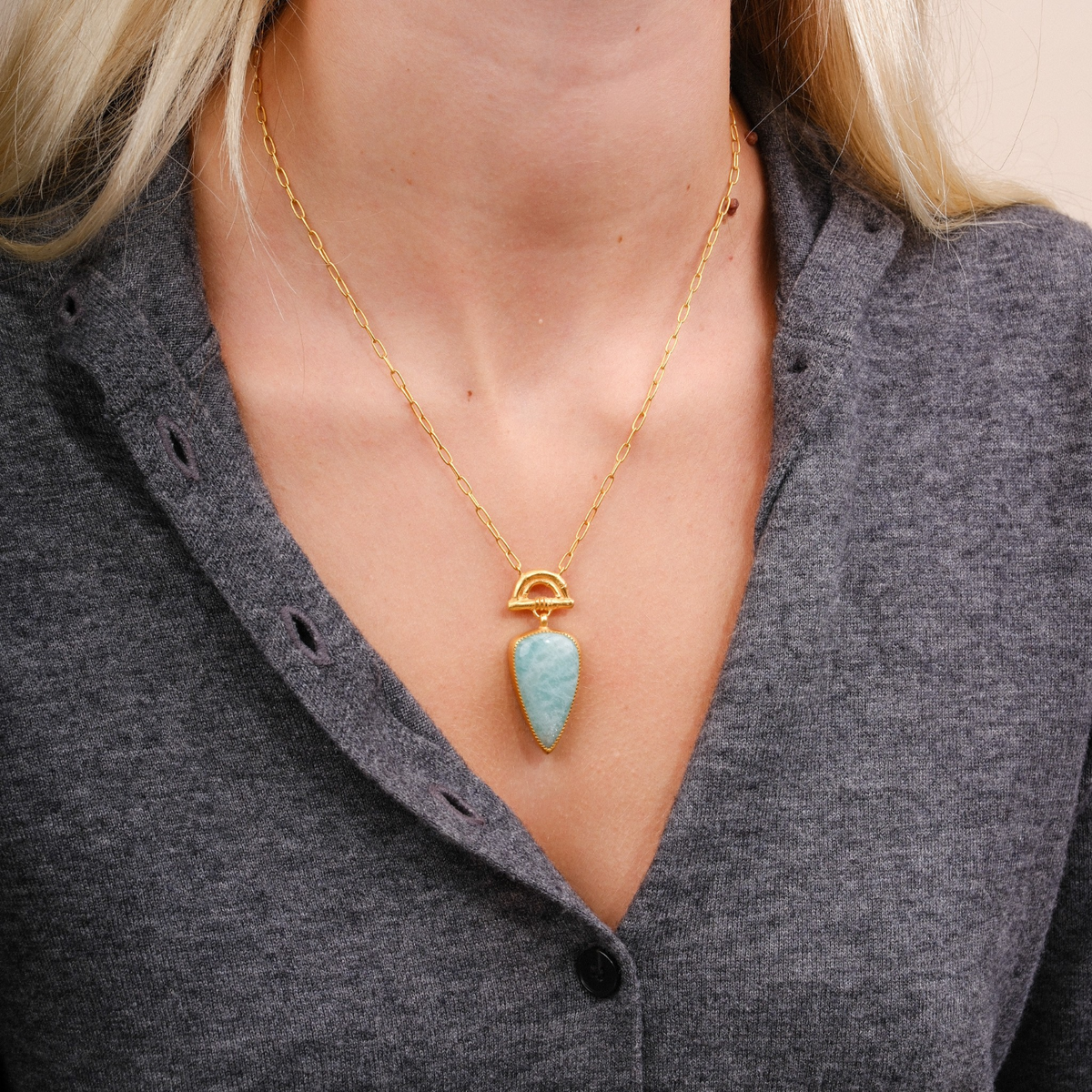 EC One Sunrise pendant featuring a pear-shaped Amazonite gemstone set in gold-plated silver on a delicate chain.