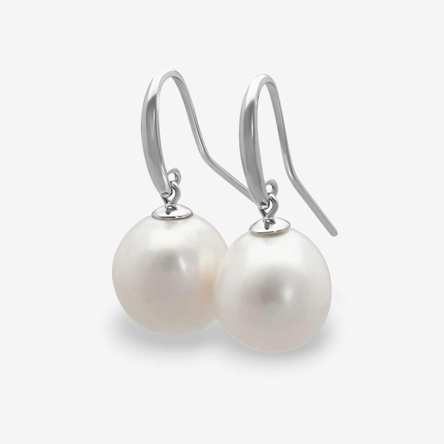 White Pearl Silver Hook Earrings at ethical jeweller E.C.one London