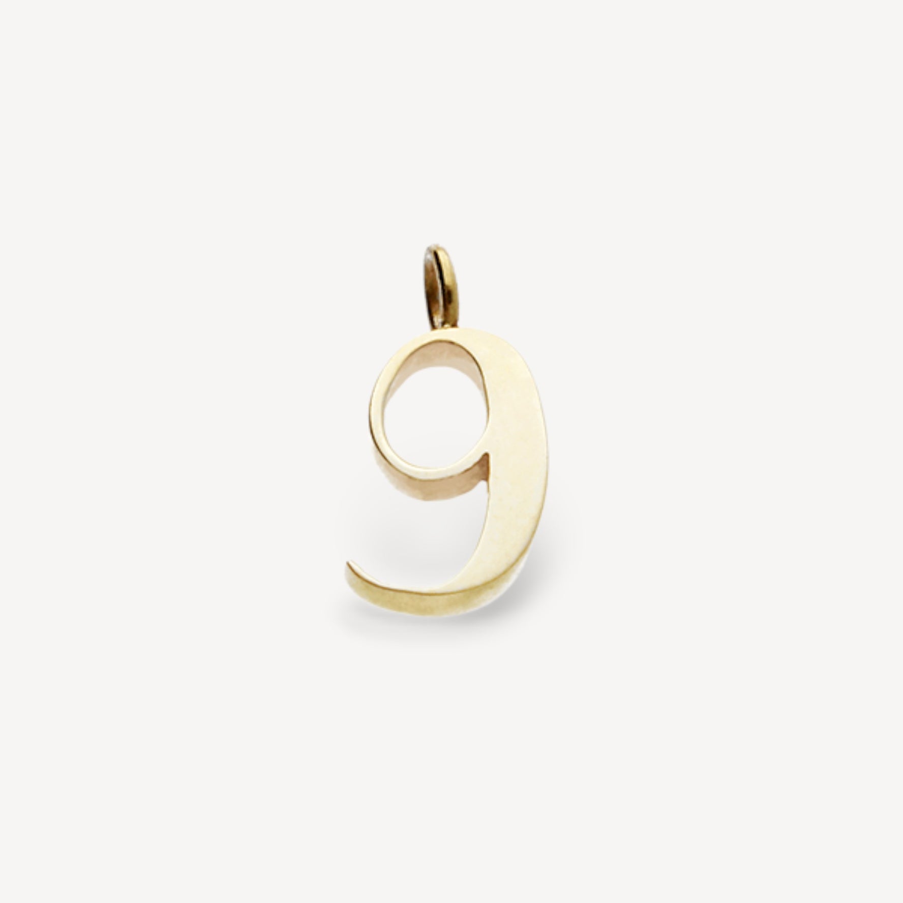 Gold number "9" charm pendant