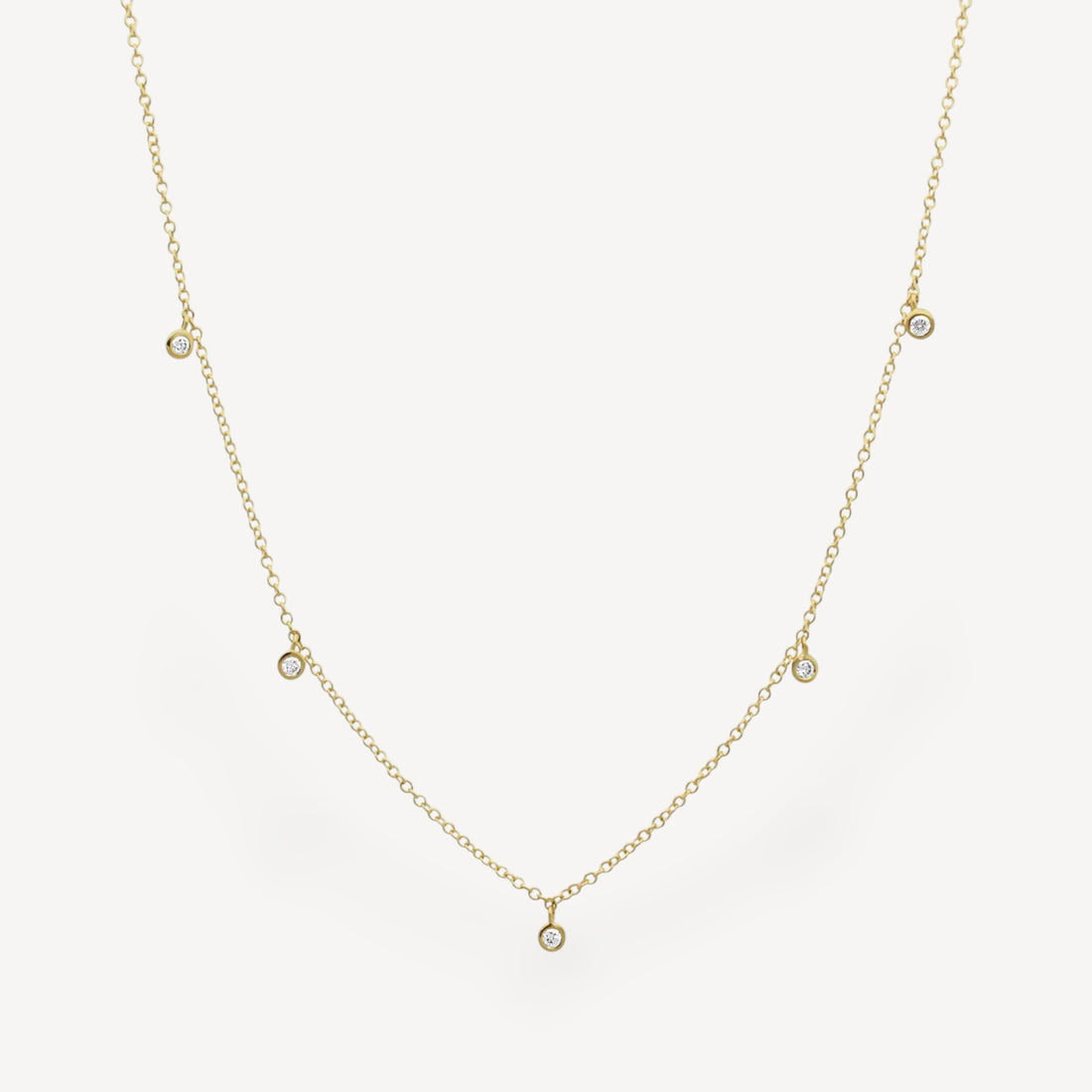 Dainty Gold Necklace with Five Hanging Diamonds