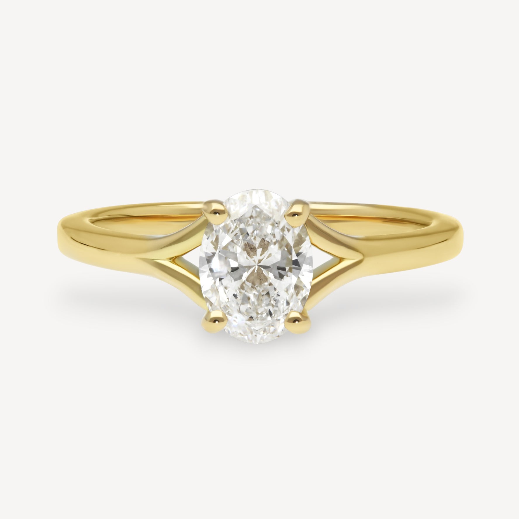 JUNO Gold Solitaire Ring with Oval White Diamond