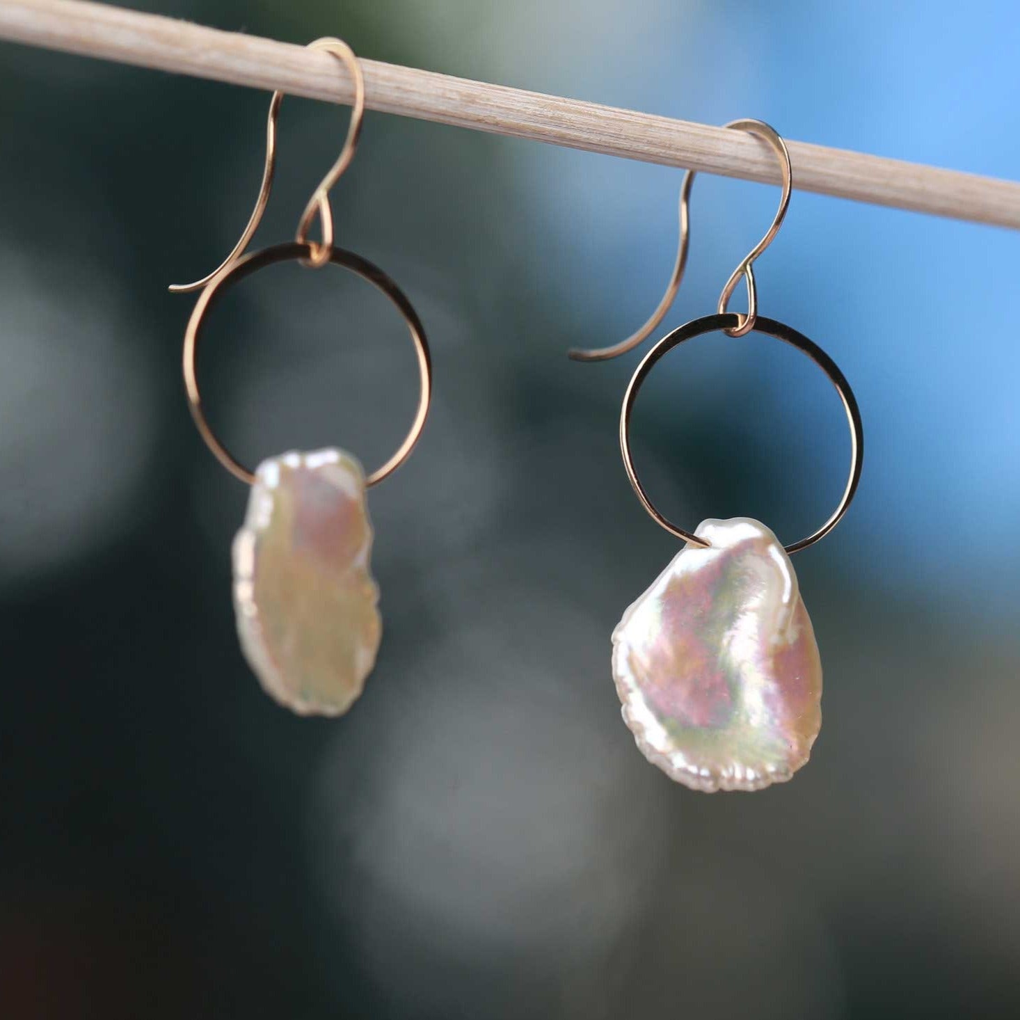 Melissa Joy Manning Large gold hoops with floating white pearls