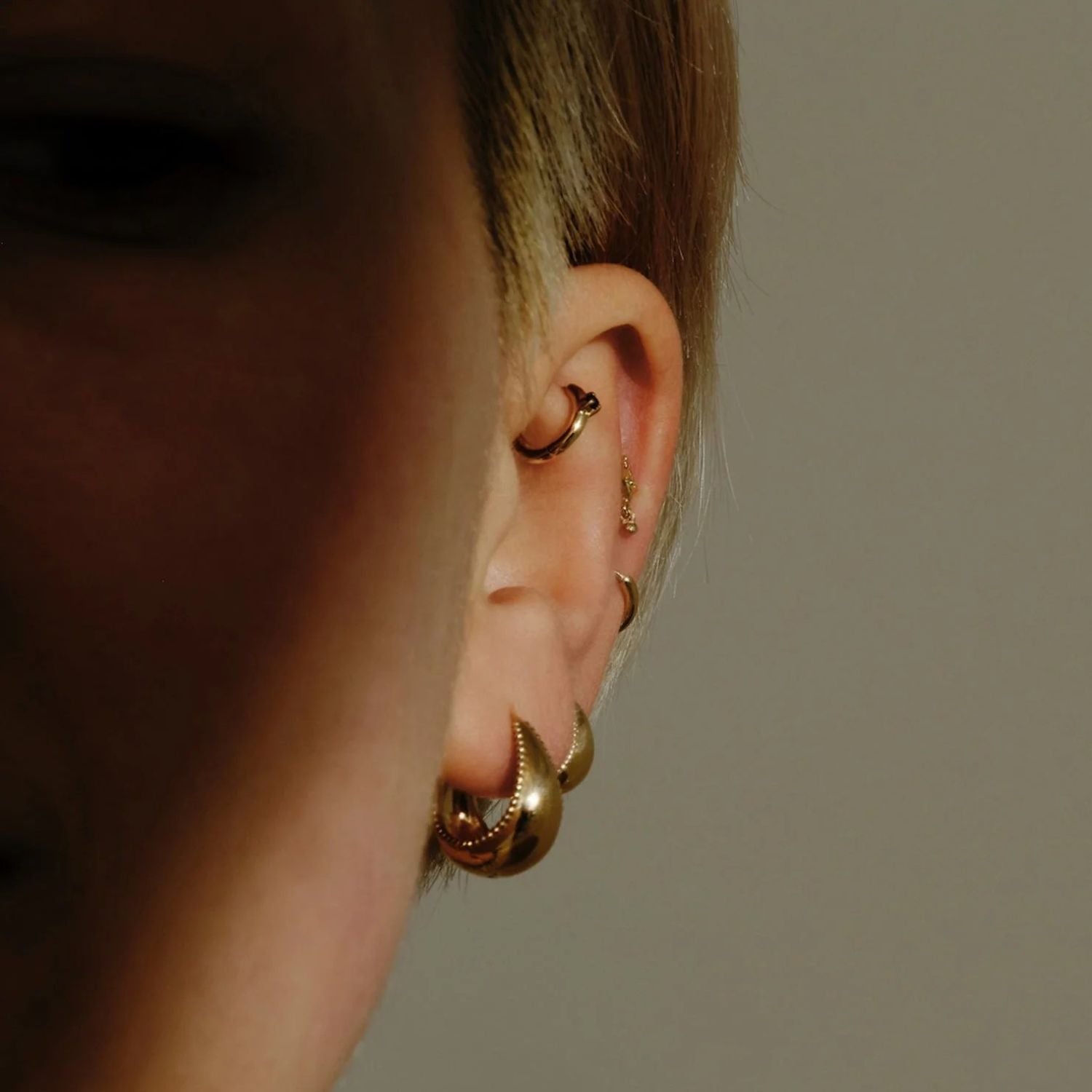Metier at ethical jewellers E.C.One London SINGLE Midi Domed Gold Huggie with Milgrain