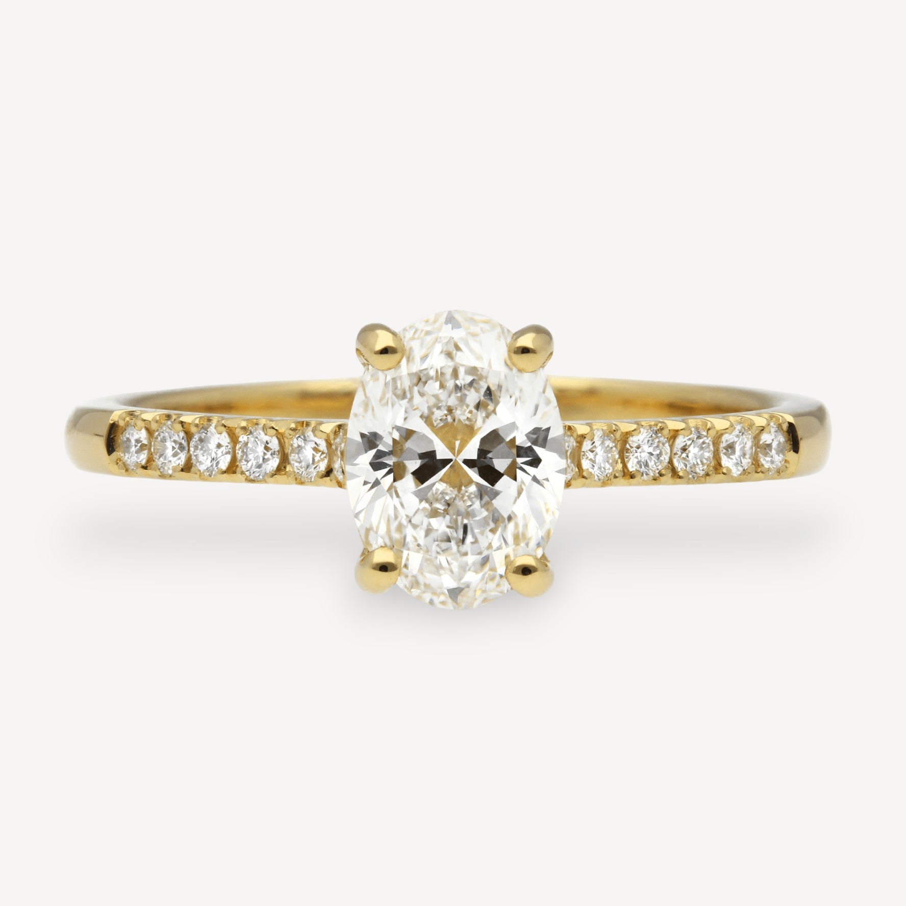 NANCY Oval Diamond Solitaire Ring with Diamond Shoulders
