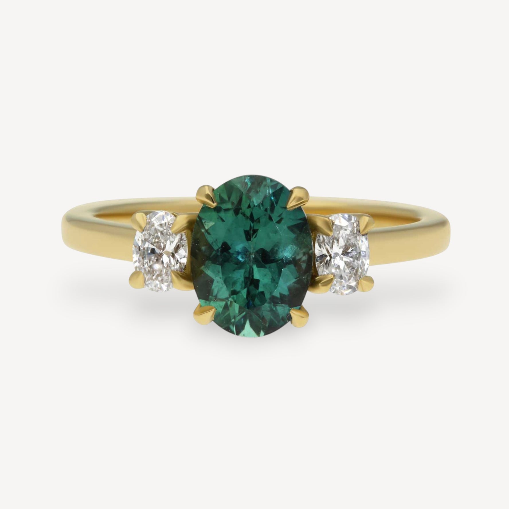 OTTILIE Teal Oval Sapphire and Diamond Yellow Gold Trilogy Engagement Ring