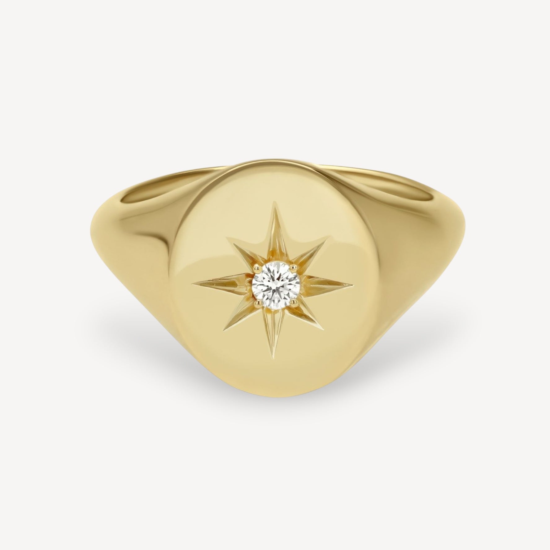 Oval Gold Signet Ring with star set Diamond