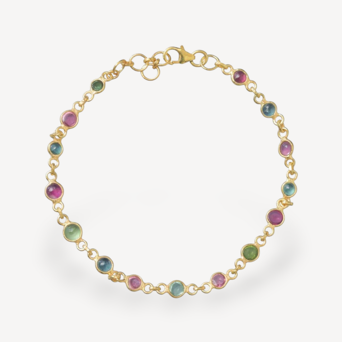 EC One gold link chain bracelet featuring round multi-colored tourmaline gemstones in bezel settings