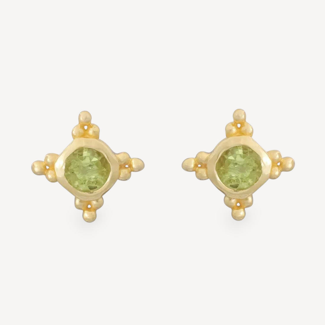 EC One STARBURST stud earrings featuring round peridot gemstones set in gold plated silver with a star design
