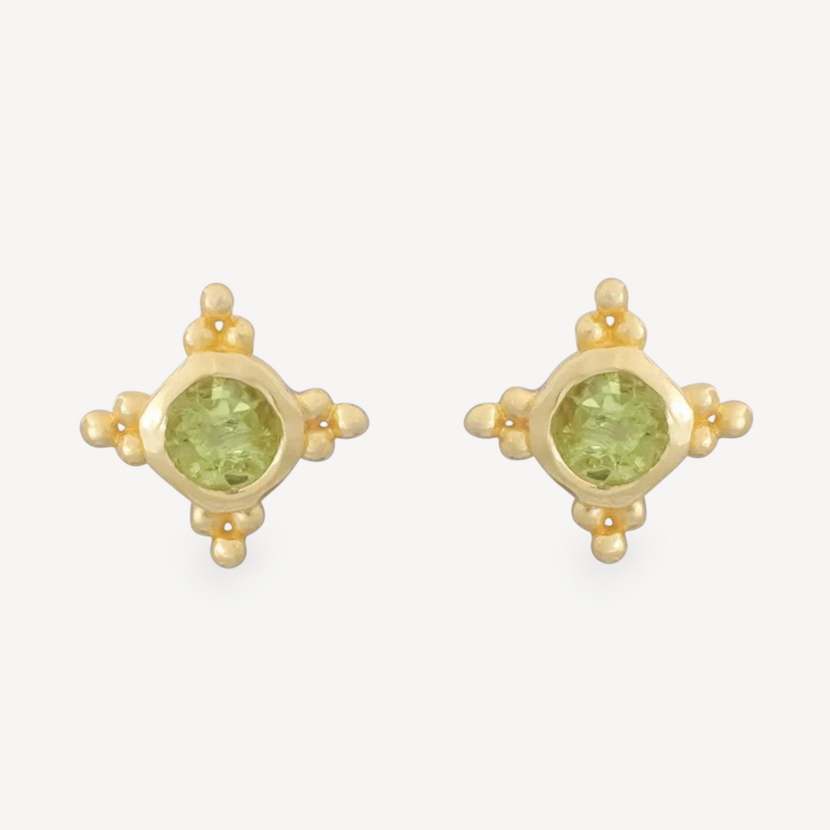 EC One STARBURST stud earrings featuring round peridot gemstones set in gold plated silver with a star design