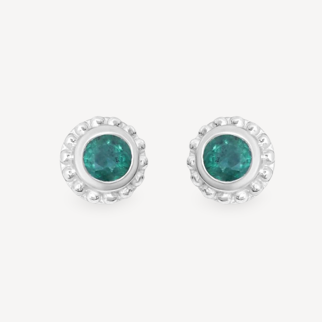 EC One SUNBEAM emerald stud earrings featuring round green gemstones set in textured silver frames