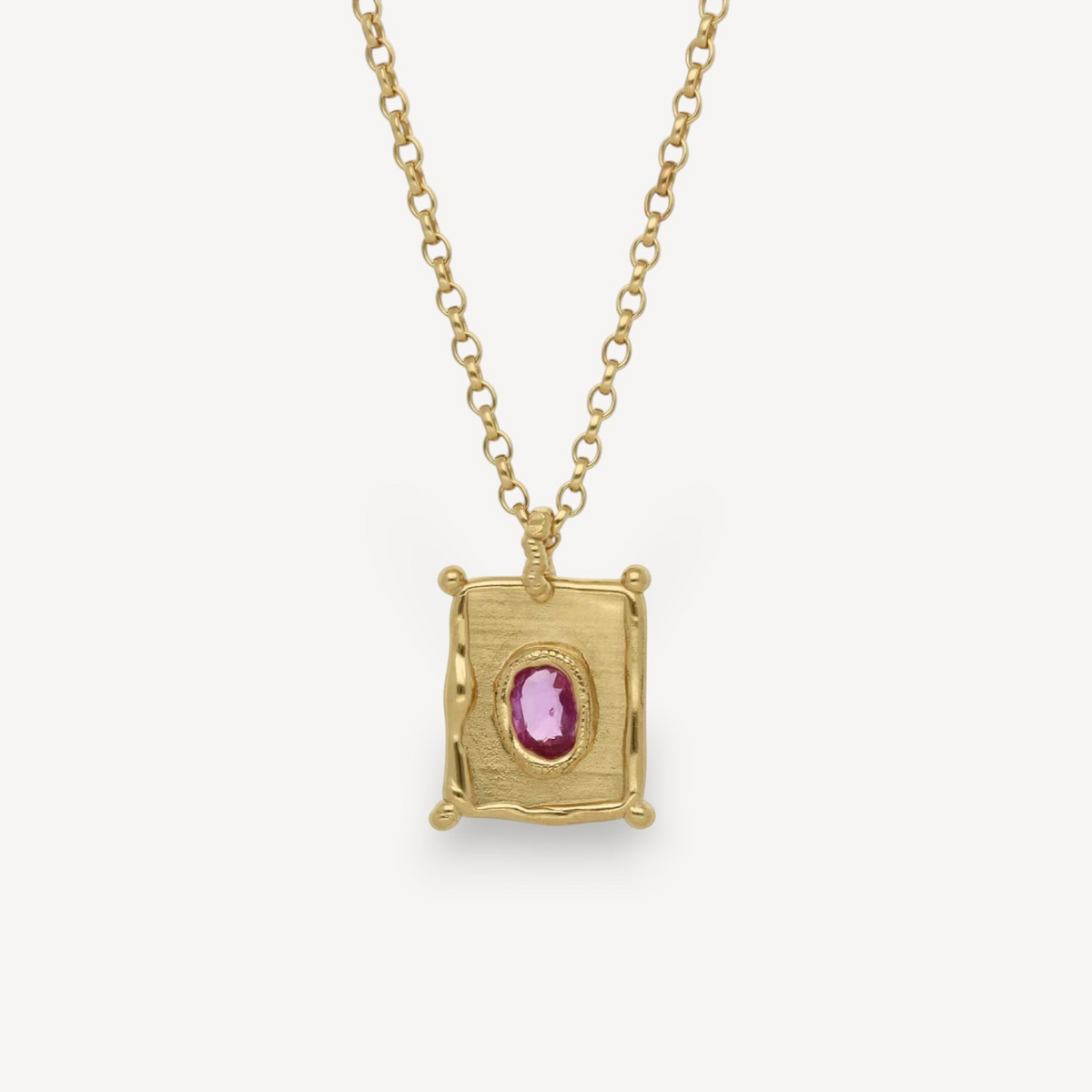 EC One TABLET mini pendant in gold plated recycled silver featuring a vibrant pink sapphire on a delicate chain